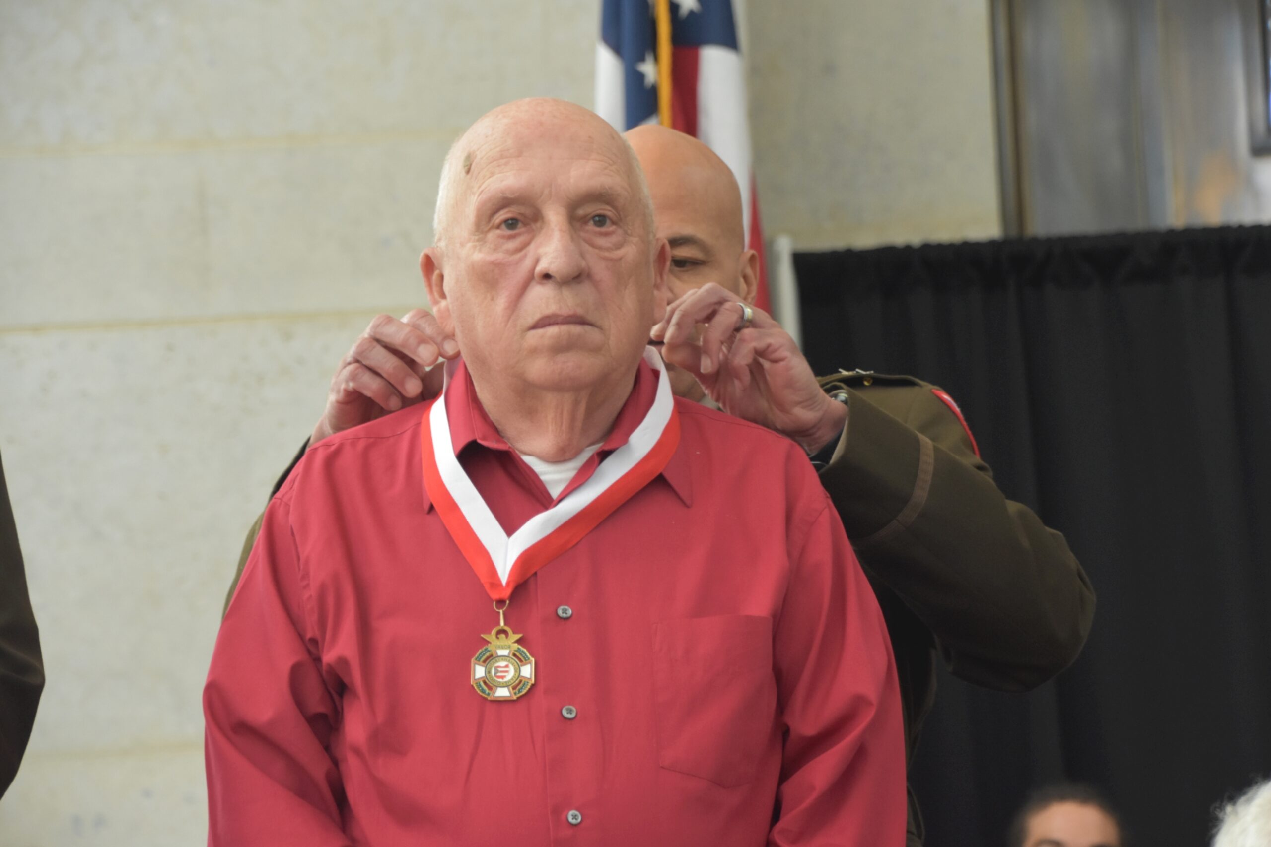 Donald L. Justice receiving his medal